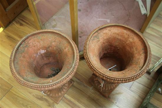 A pair of Victorian terracotta campana urns, H.1ft 8in. Diam.1ft 2in.